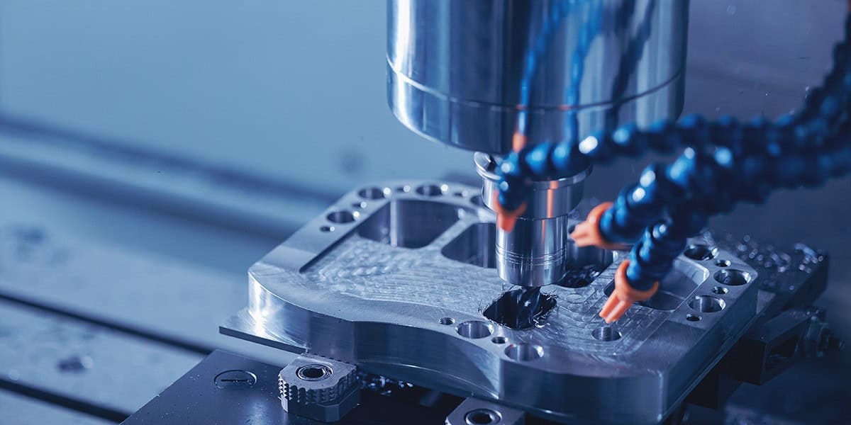 cnc-machine-cutting-metal-sparks