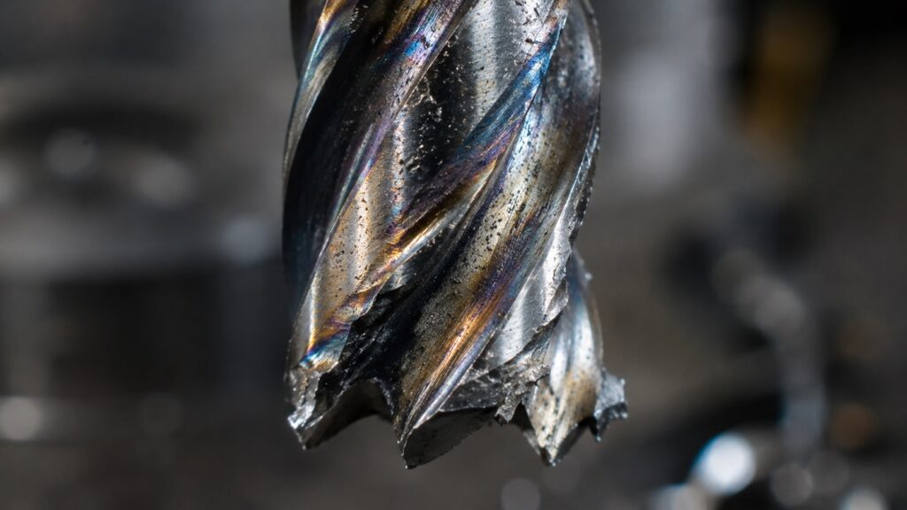 Damaged carbide end mill from improper CNC cutting parameters