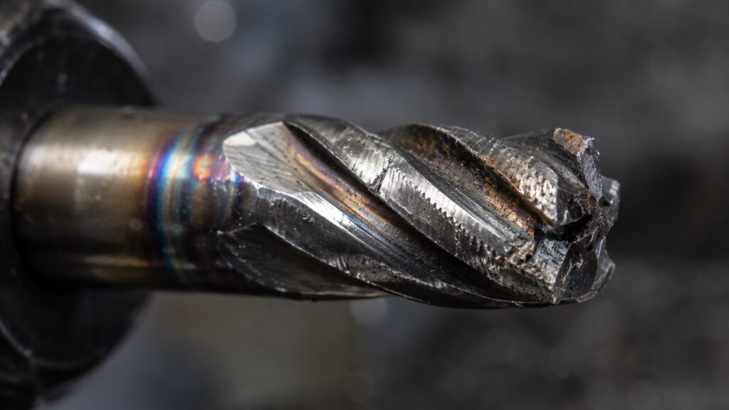 Damaged carbide end mill from chatter and excessive heat