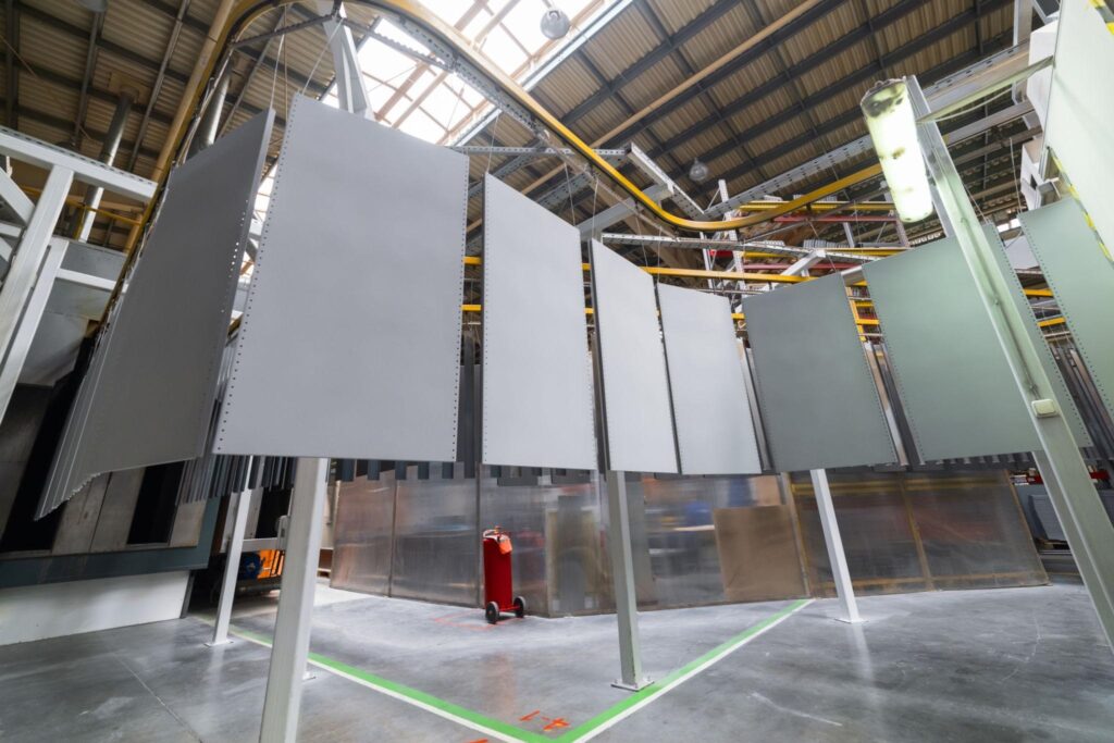 powder coating process on steel furniture showing durable protective finish